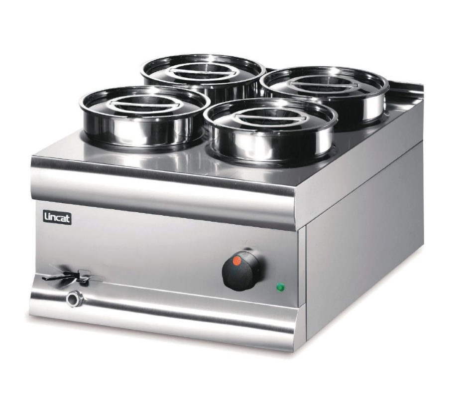 a stainless steel stove top with four burners on it.